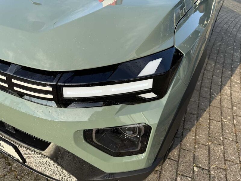 Grün Neu 2024 Dacia Spring Extreme Kleinwagen | 18.565 € (Fairer Preis) - Bild 1/4
