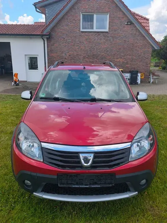 Gebraucht Dacia Sandero Stepway 84 PS (61 kW) 2012 Rot Limousine