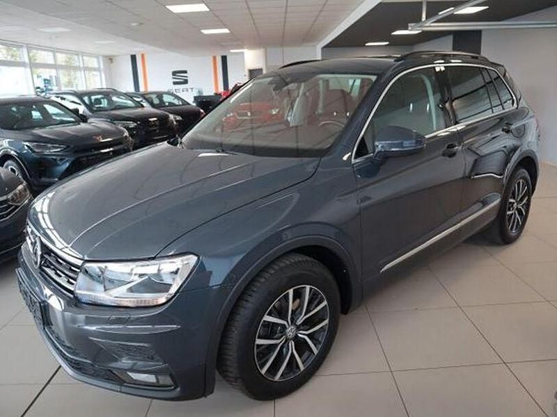 Grau Gebraucht 2020 VW Tiguan R-line SUV | 23.590 € - Bild 1/4