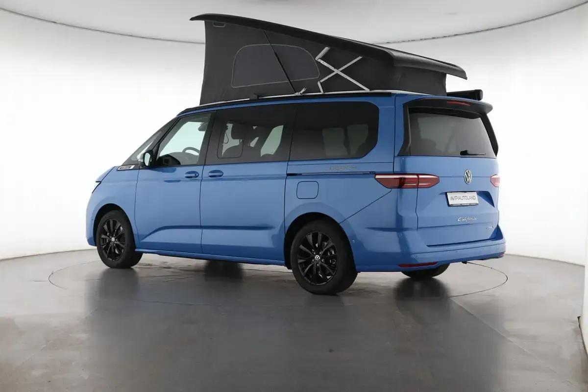 Gebraucht VW T7 Beach 245 PS (180 kW) 2026 Medium blue / deep black perleff Van