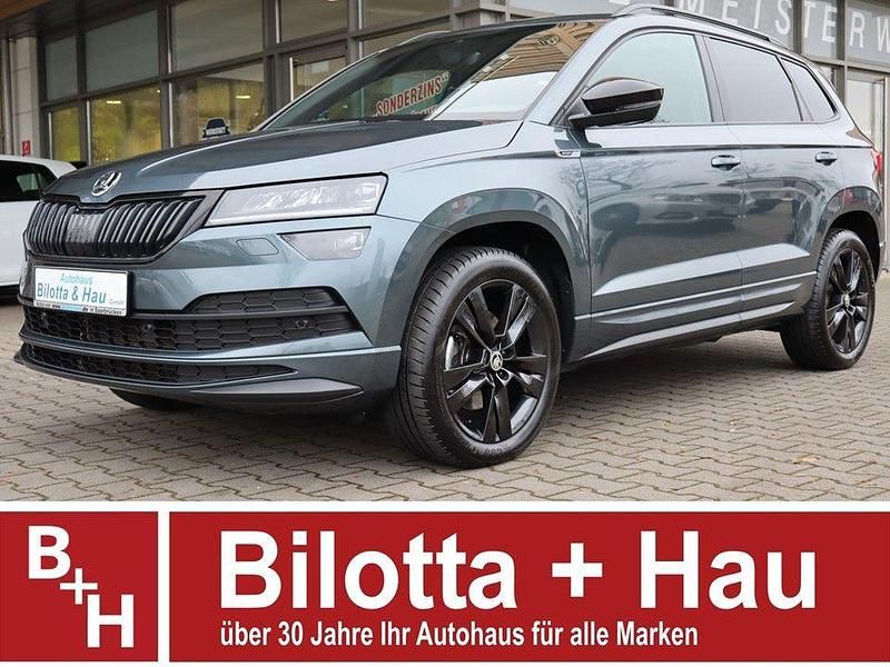 Grau Gebraucht 2019 Skoda Karoq SportLine SUV | 27.950 € (Fairer Preis) - Bild 1/4