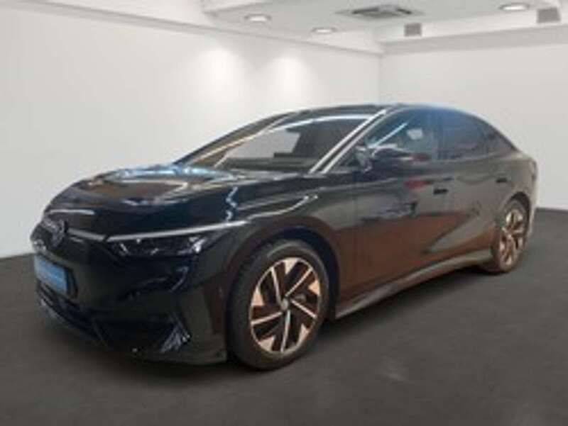 Schwarz (grenadillschwarz metallic) Gebraucht 2024 VW ID.7 Pro Limousine | 56.995 € - Bild 1/4