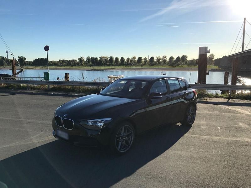 Second-hand BMW 114 102 CP (75 kW) 2012 Negru Hatchback