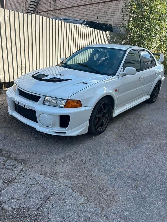 Weiß Gebraucht 1998 Mitsubishi Lancer Limousine | 28.000 € (Fairer Preis) - Bild 1/4