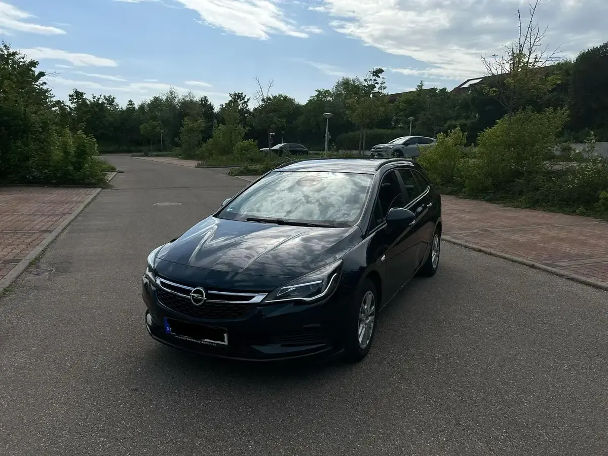 Gebraucht Opel Astra 110 PS (80 kW) 2016 Grün Kombi