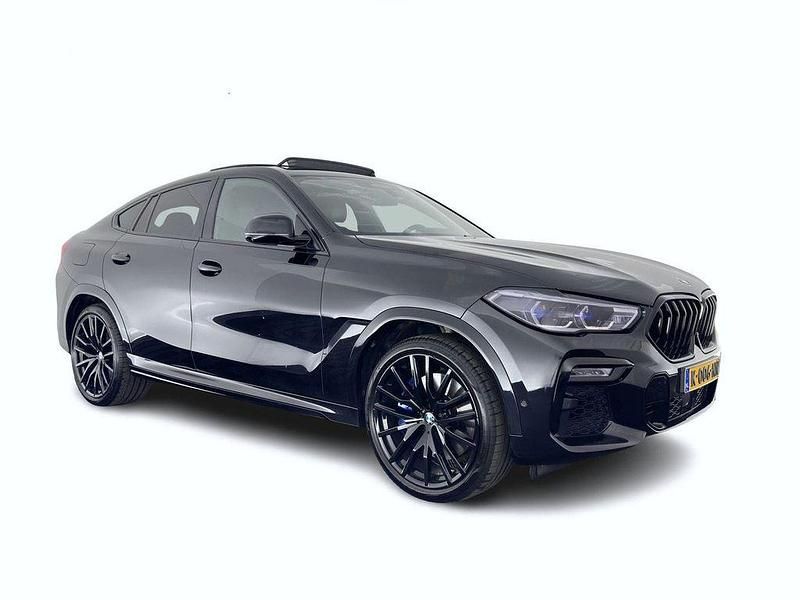 Schwarz Gebraucht 2020 BMW X6 M50 Executive SUV | 57.944 € (Teuer) - Bild 1/4