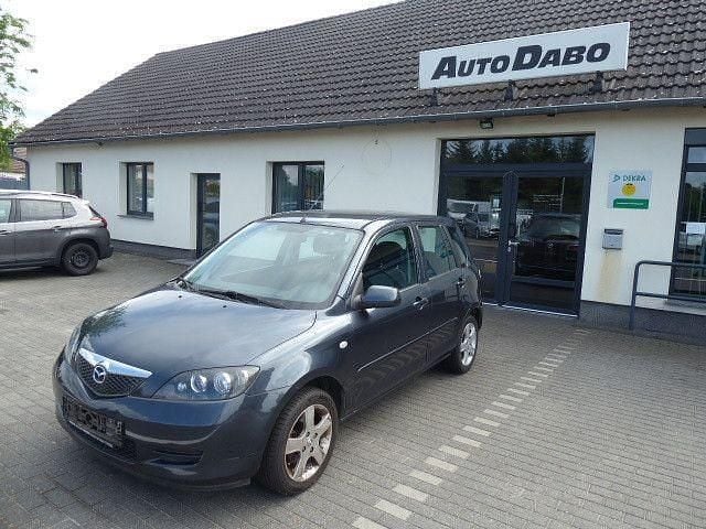 Grau Gebraucht 2005 Mazda 2 Active Limousine | 550 € (Superpreis) - Bild 1/4