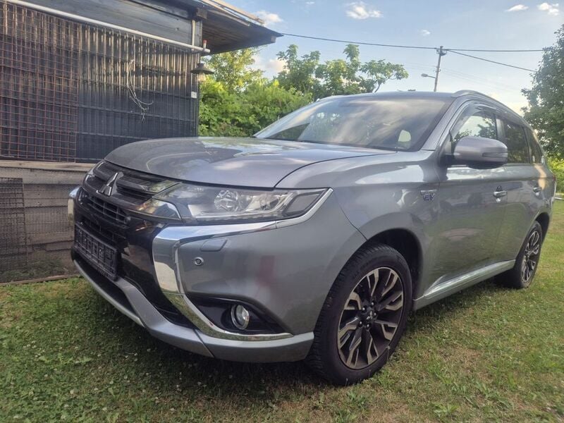 Grau Gebraucht 2016 Mitsubishi Outlander P-HEV SUV | 7.500 € - Bild 1/4