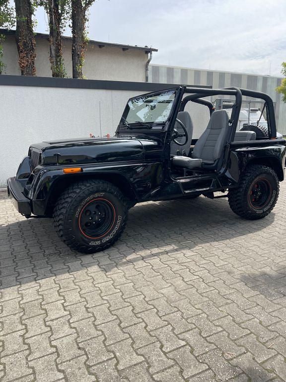 Schwarz Gebraucht 1992 Jeep Wrangler SUV | 25.999 € - Bild 1/4