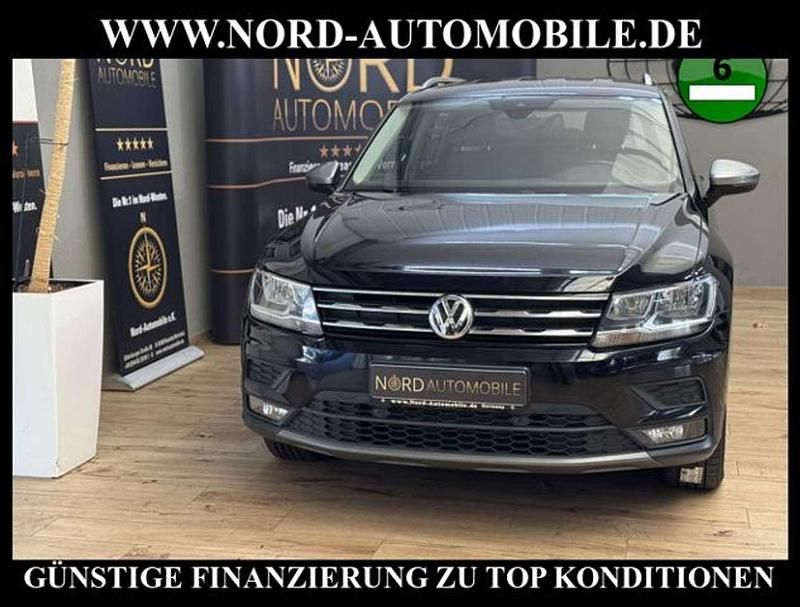 Deep black perleffek (metallic) Gebraucht 2020 VW Tiguan Allspace Comfortline SUV | 25.900 € (Superpreis) - Bild 1/3