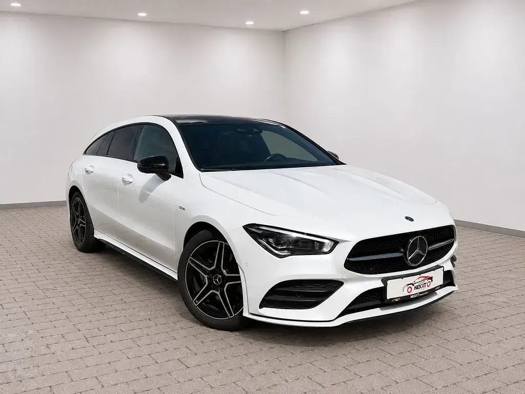 Gebraucht Mercedes CLA200 AMG 163 PS (119 kW) 2021 Digitalweiss  metalliclack Coupé