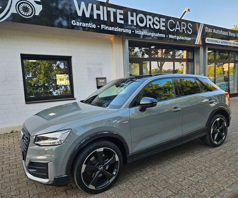 Grau Gebraucht 2017 Audi Q2 Design SUV | 21.198 € (Etwas zu teuer) - Bild 1/4