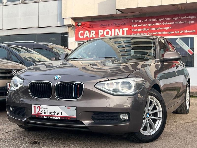 Braun Gebraucht 2013 BMW 116 Kleinwagen | 13.490 € (Teuer) - Bild 1/3