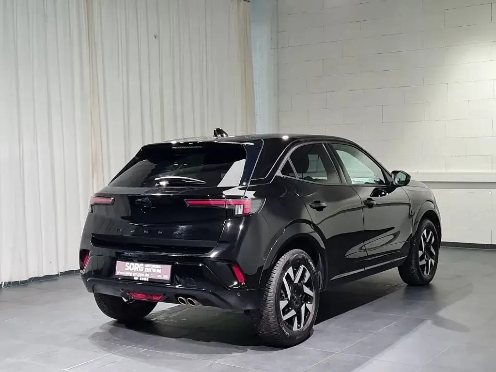 Gebraucht Opel Mokka 131 PS (96 kW) 2025 Schwarz, karbon schwarz metallic SUV
