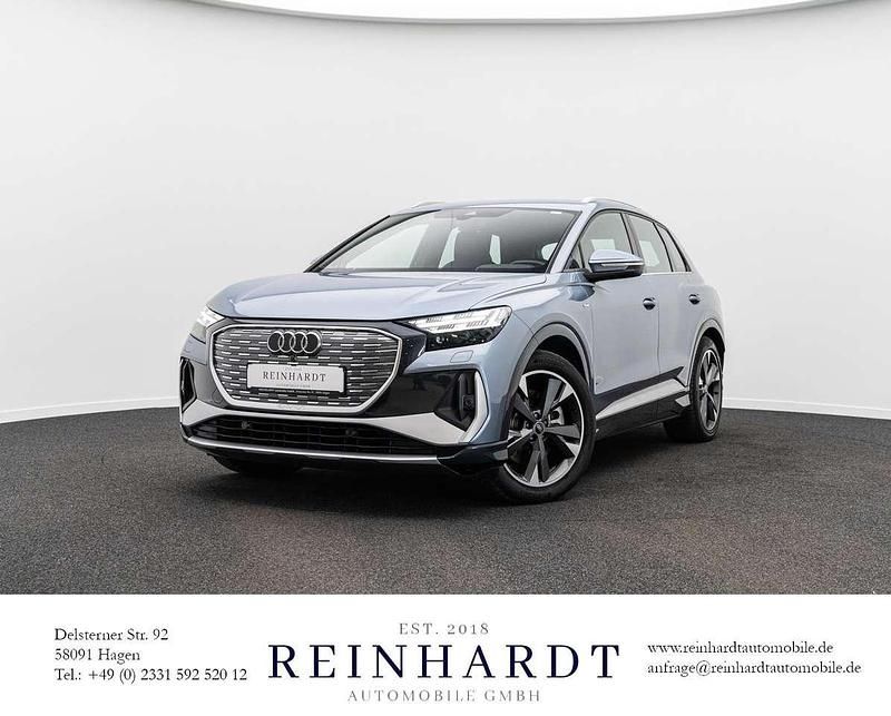 Geysirblau metallic Gebraucht 2024 Audi Q4 e-tron S-Line SUV | 43.125 € (Fairer Preis) - Bild 1/3