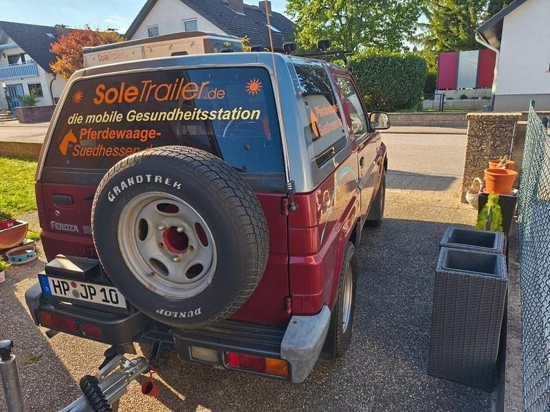 Rot Gebraucht 1995 Daihatsu Rocky SUV | 2.500 € - Bild 1/4
