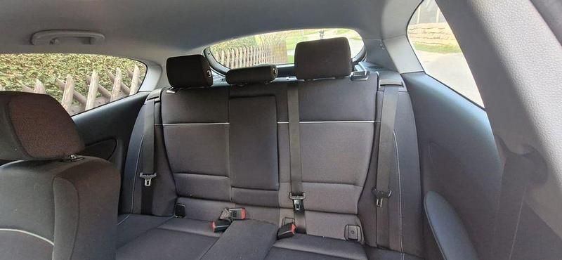 Używany BMW 118 Performance 143 KM (105 kW) 2010 Czarny Hatchback