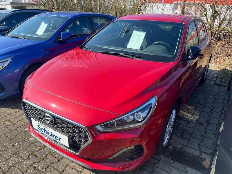 Fiery red / mic Gebraucht 2019 Hyundai i30 Turbo Kleinwagen | 15.490 € (Fairer Preis) - Bild 1/1