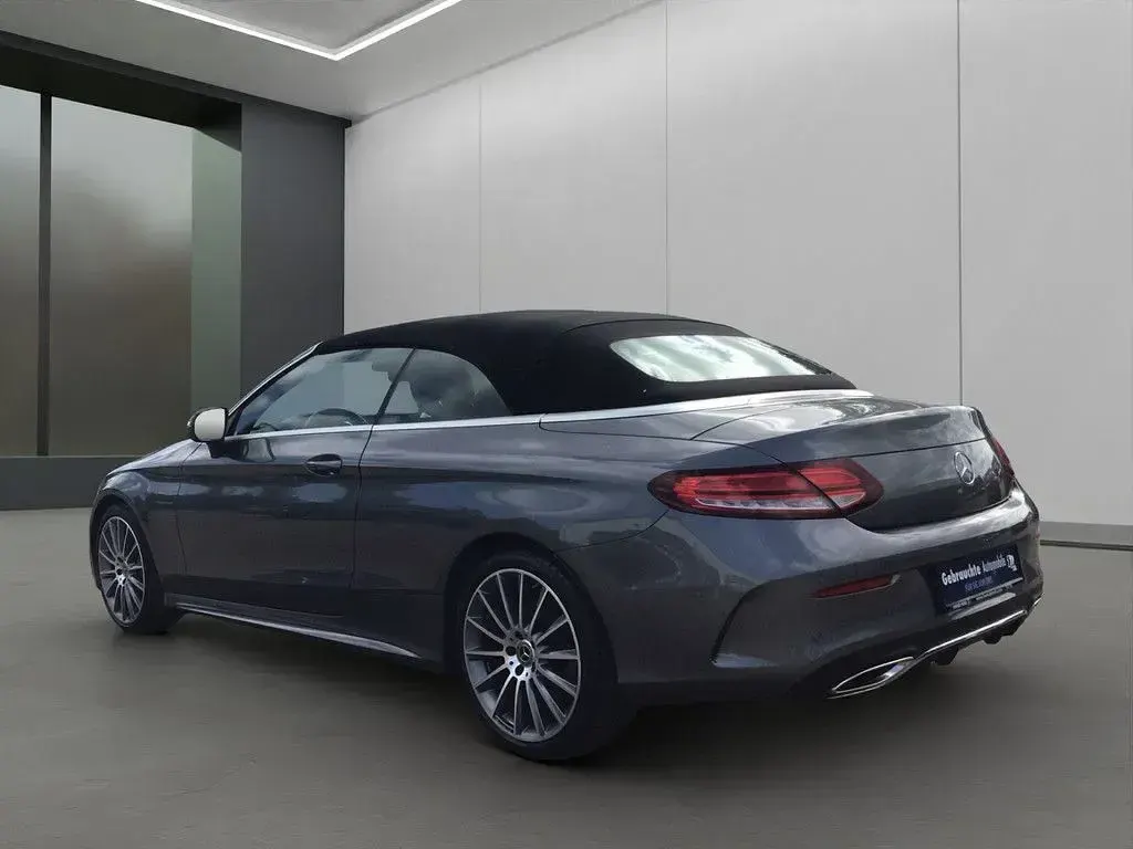 Gebraucht Mercedes C180 AMG 156 PS (114 kW) 2019 Grau / selenitgrau (metallic) Cabrio