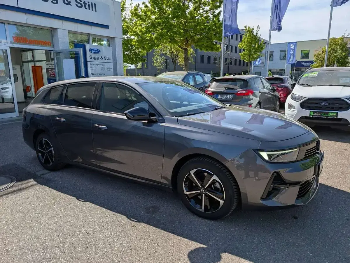 Gebraucht Opel Astra 131 PS (96 kW) 2024 Vulkan grau Kombi