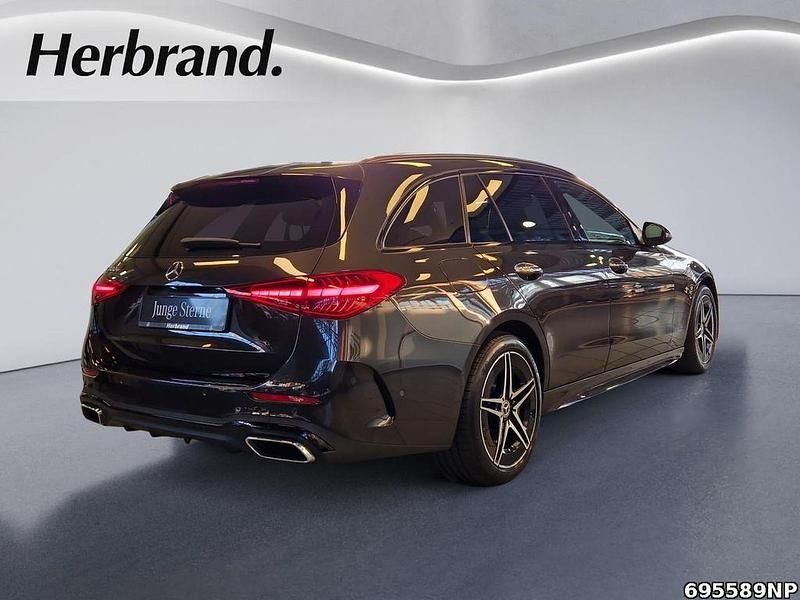 Gebraucht Mercedes C300e AMG line 204 PS (150 kW) 2023 Metalliclack graphitgrau Kombi