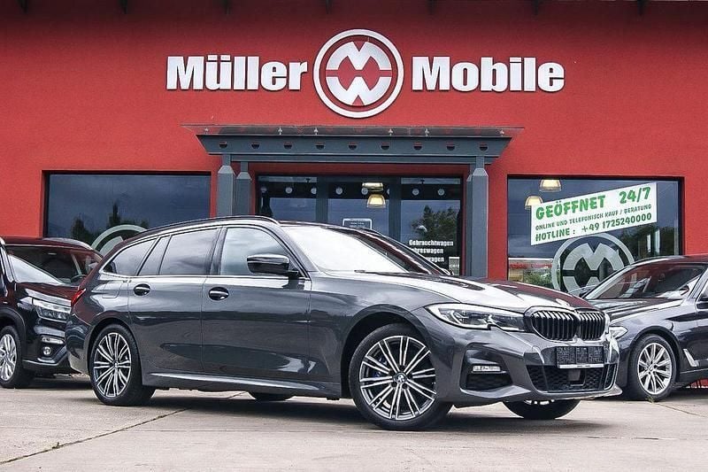 Dravitgrau Gebraucht 2020 BMW 330e M Sport Kombi | 27.900 € (Fairer Preis) - Bild 1/4