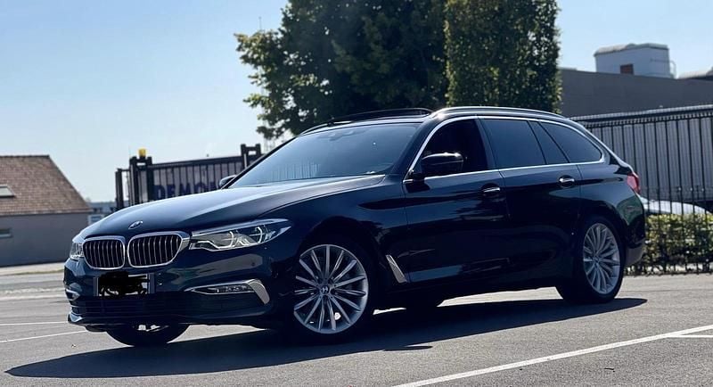 Second-hand BMW 520 Luxury Line 190 CP (139 kW) 2018 Negru Break