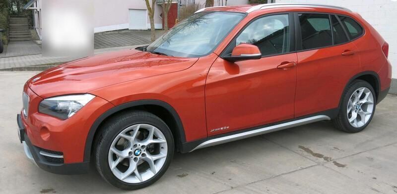 Orange Gebraucht 2012 BMW X1 SUV | 13.900 € - Bild 1/4