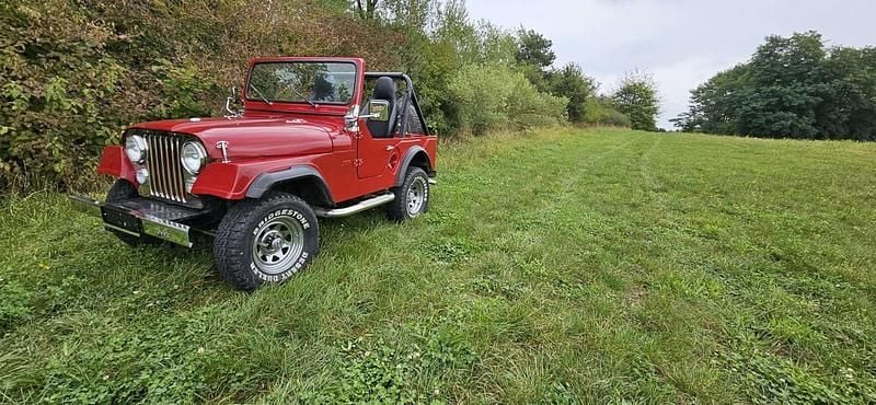 Rot Gebraucht 1957 Jeep Willys Overland SUV | 13.900 € - Bild 1/4