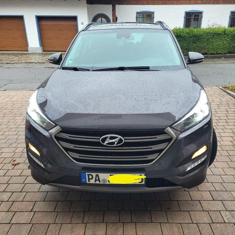 Braun Gebraucht 2015 Hyundai Tucson Premium SUV | 13.900 € (Fairer Preis) - Bild 1/4