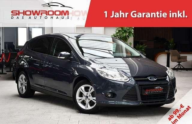 Grau Gebraucht 2013 Ford Focus Trend Limousine | 5.890 € (Fairer Preis) - Bild 1/4