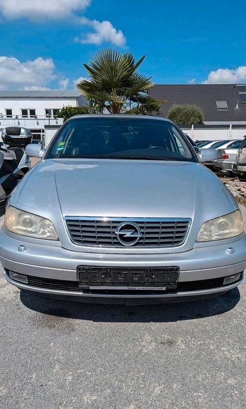 Second-hand Opel Omega 179 CP (131 kW) 2002 Argintiu Berlinǎ