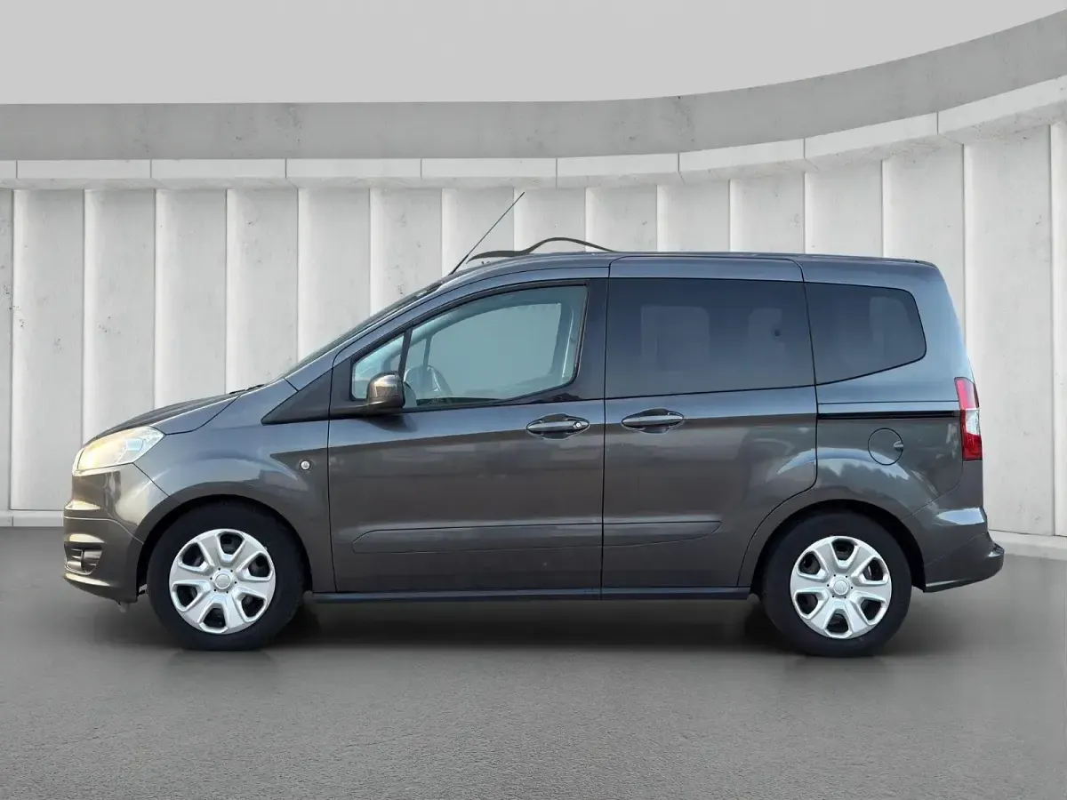 Gebraucht Ford Tourneo Courier Trend 101 PS (74 kW) 2016 Grau Van / Kleinbus