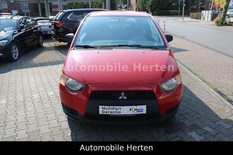 Gebraucht Mitsubishi Colt Inform 95 PS (69 kW) 2009 Rot Kleinwagen