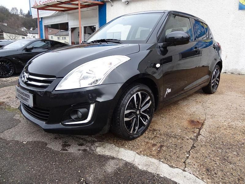 Schwarz Gebraucht 2015 Suzuki Swift X-TRA Limousine | 9.990 € (Teuer) - Bild 1/4