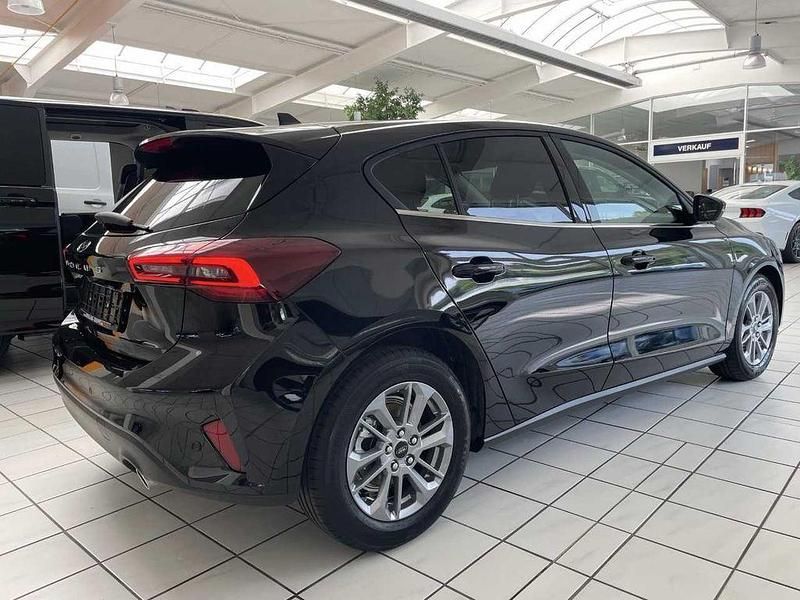 Gebraucht Ford Focus Titanium 125 PS (91 kW) 2025 Agate black metallic schwarz Limousine