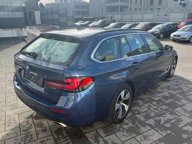 Gebraucht BMW 520 190 PS (139 kW) 2022 Phytonicblau metallic Kombi