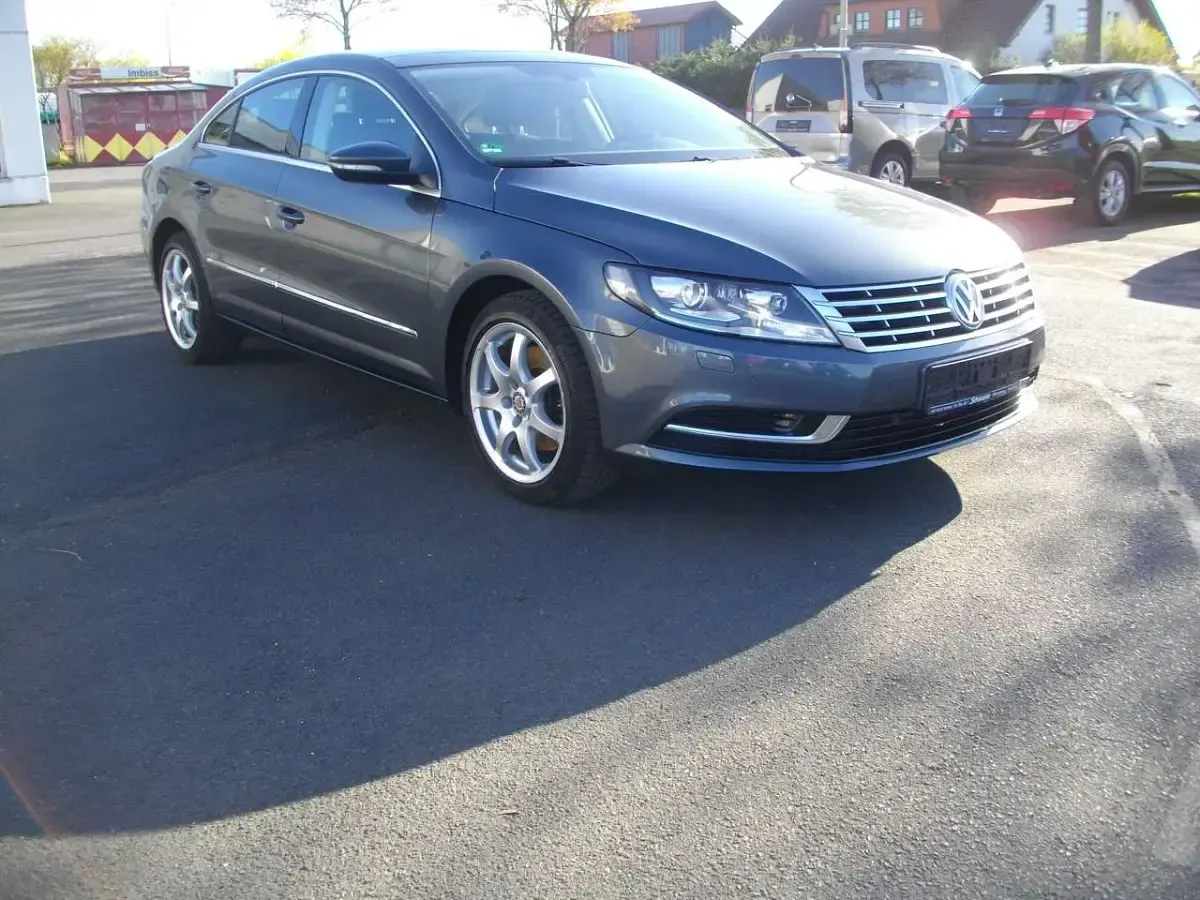 Gebraucht VW Passat 140 PS (102 kW) 2014 Islandgrau perleffekt Coupé