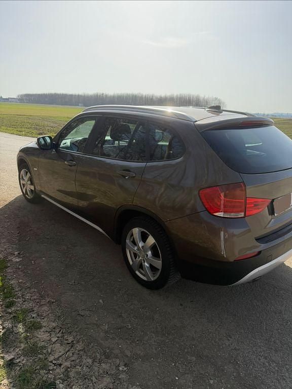 Second-hand BMW X1 143 CP (105 kW) 2012 Maro SUV