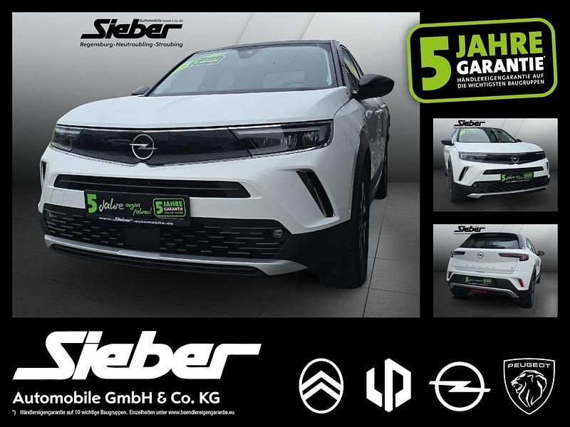 Jade weiss/arktis weiss Gebraucht 2022 Opel Mokka-e Elegance SUV | 16.990 € (Guter Preis) - Bild 1/4