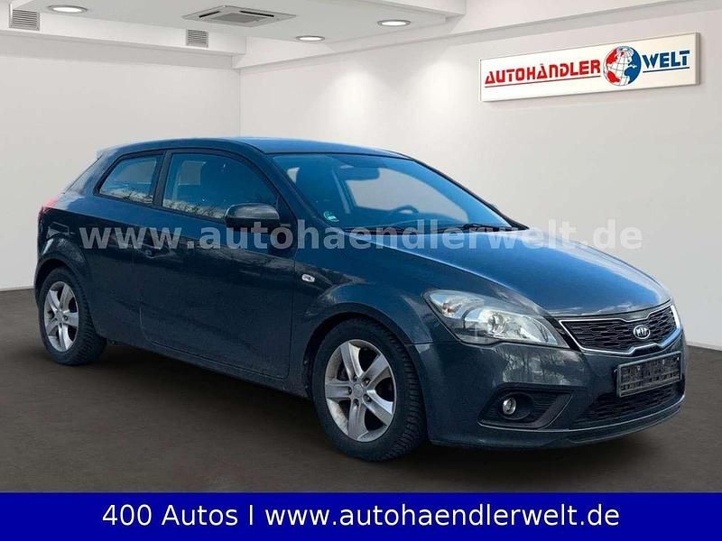 Usado Kia Ceed 90 HP (66 kW) 2013 Cinzento Citadino