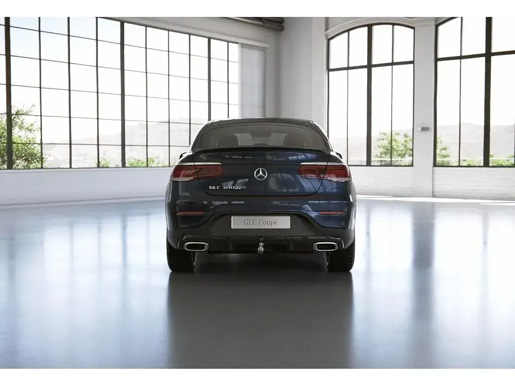 Gebraucht Mercedes GLC300e AMG 306 PS (225 kW) 2023 Cavansitblau metallic Coupé