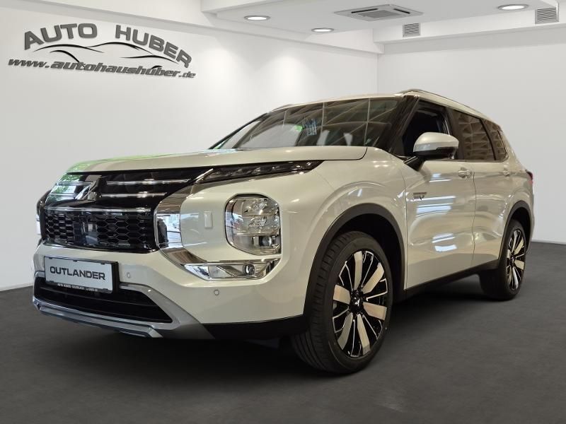 White metallic Neu 2025 Mitsubishi Outlander P-HEV Intro Edition SUV | 48.290 € (Superpreis) - Bild 1/4