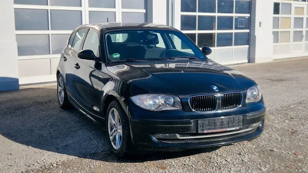 Gebraucht BMW 116 122 PS (89 kW) 2009 Schwarz Kleinwagen