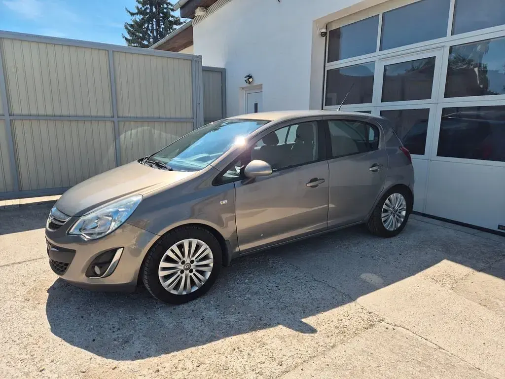 Gebraucht Opel Corsa Edition 75 PS (55 kW) 2011 Braun Kleinwagen