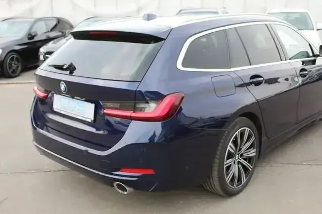 Gebraucht BMW 330 Comfort Edition 286 PS (210 kW) 2023 Tansanitblau ii metallic Kombi