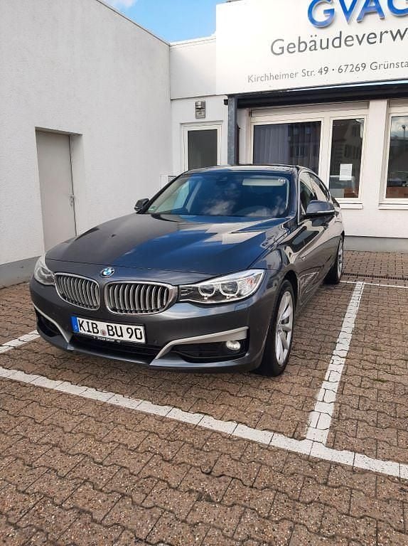 Grau Gebraucht 2014 BMW 320 Gran Turismo Limousine | 12.000 € (Teuer) - Bild 1/4