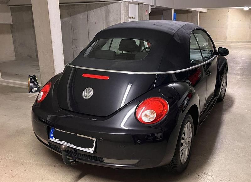 Gebraucht VW New Beetle 75 PS (55 kW) 2008 Schwarz Kleinwagen
