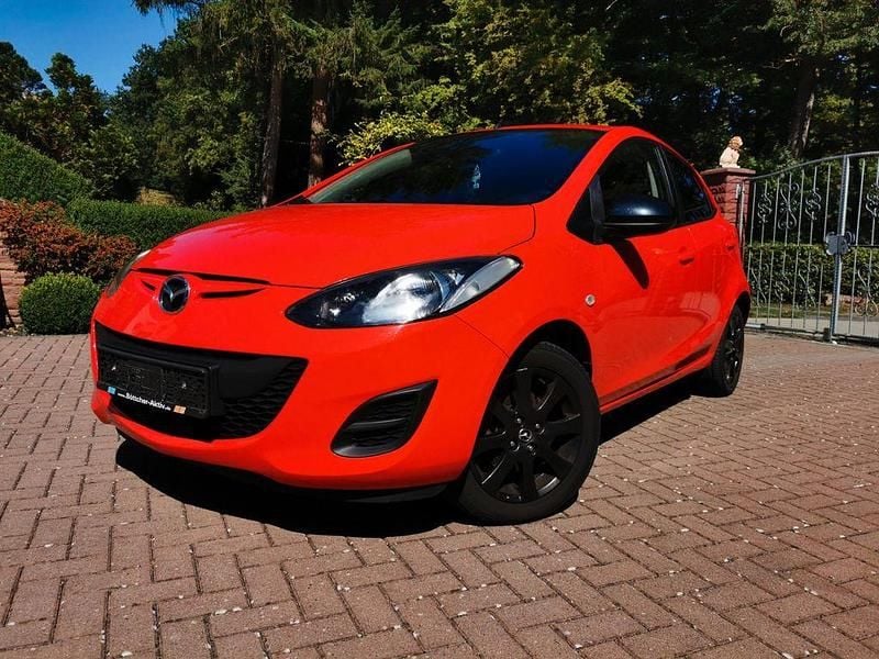 Second-hand Mazda 2 Inclusive 75 CP (55 kW) 2013 Roșu Hatchback
