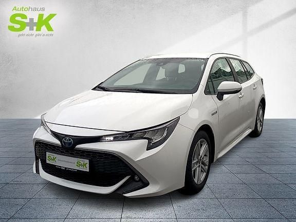 Schneeweiß Gebraucht 2021 Toyota Corolla Business Edition Kombi | 19.980 € (Fairer Preis) - Bild 1/4